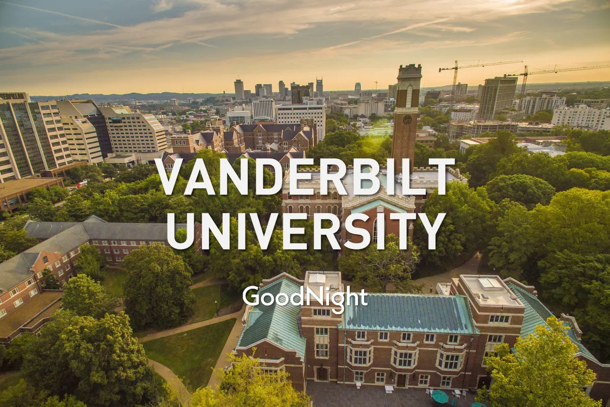 A sweeping view over Vanderbilt University’s campus, featuring iconic buildings like the clock tower, interspersed with lush greenery and framed by the Nashville city skyline in the background. The sunset lighting adds an inspirational, dynamic mood.