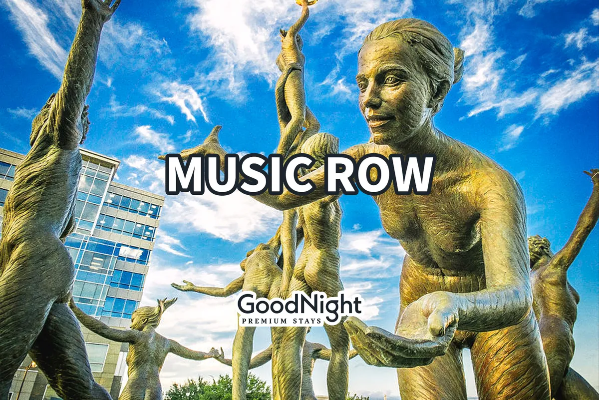 An energetic city scene featuring engaging sculptures, open skies, and people strolling and interacting with public art. The atmosphere is celebratory and welcoming, ideal for family walks or exploring local culture together.